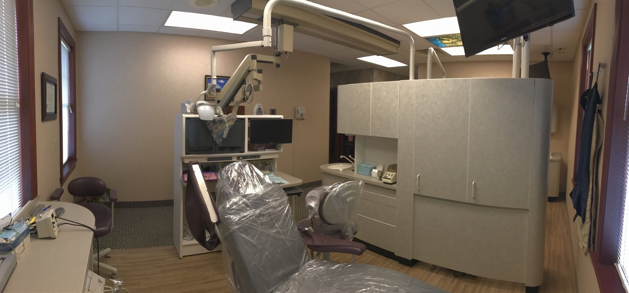 A treatment room with the surgical microscope and imaging equipment